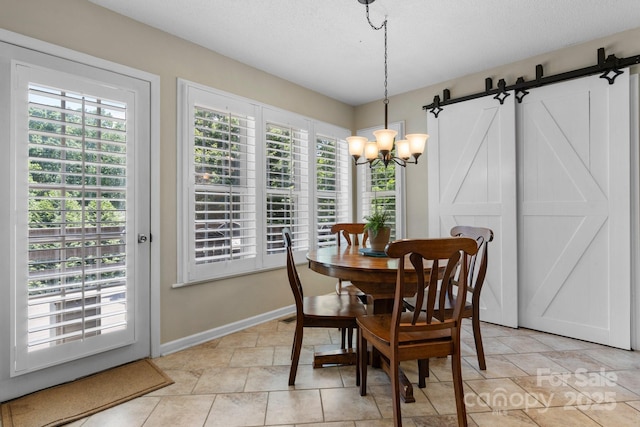 1321 Birch Dr, Morganton, NC 28655 - dining space with a chandelier, healthy amount of natural light, and baseboards