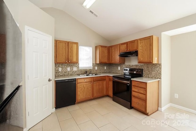 2599 April Showers Ln, Rock Hill, SC 29730 - kitchen featuring dishwasher, range with electric stovetop, freestanding refrigerator, under cabinet range hood, and a sink