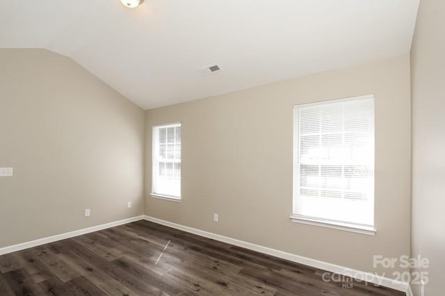 2599 April Showers Ln, Rock Hill, SC 29730 - spare room with vaulted ceiling, dark wood-style flooring, and baseboards