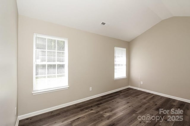 2599 April Showers Ln, Rock Hill, SC 29730 - empty room with vaulted ceiling, dark wood-style floors, and baseboards