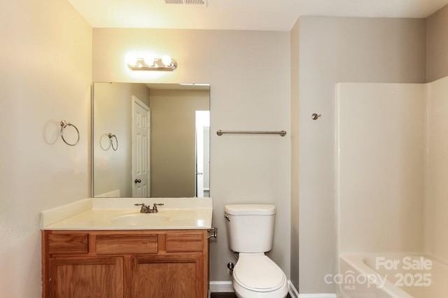2599 April Showers Ln, Rock Hill, SC 29730 - bathroom featuring toilet, vanity, baseboards, and shower / washtub combination