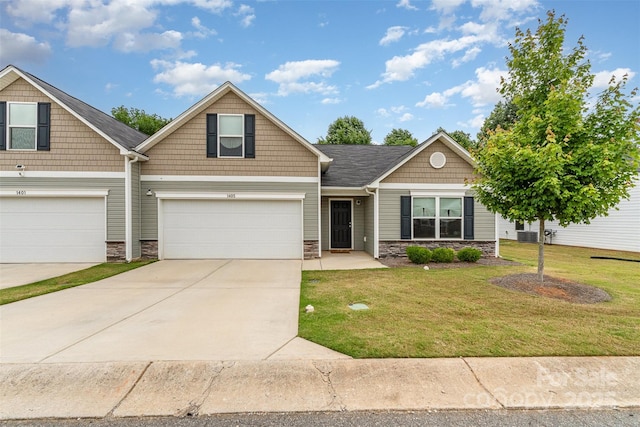 1405 Amberlight Cir, Salisbury, NC 28144 - craftsman-style home featuring stone siding, a garage, a front yard, and concrete driveway
