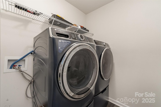 1405 Amberlight Cir, Salisbury, NC 28144 - laundry area featuring washer and dryer and baseboards