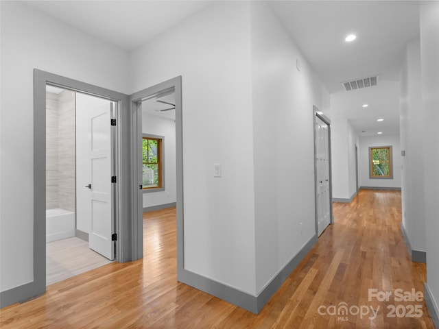 314 Gallimore Rd Unit 1, Brevard, NC 28712 - corridor with light wood-style flooring, recessed lighting, and baseboards