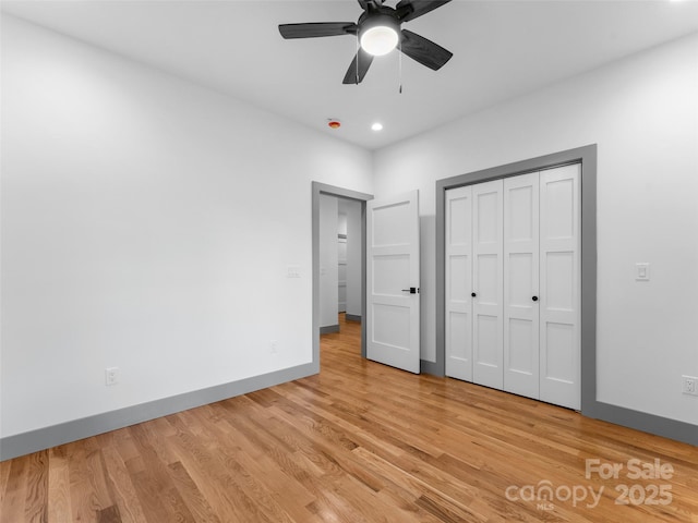 314 Gallimore Rd Unit 1, Brevard, NC 28712 - unfurnished bedroom featuring light wood-style floors, baseboards, recessed lighting, a closet, and ceiling fan