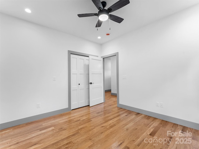 314 Gallimore Rd Unit 1, Brevard, NC 28712 - unfurnished bedroom featuring light wood-type flooring, recessed lighting, baseboards, a closet, and ceiling fan