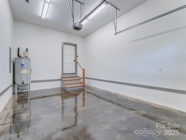 314 Gallimore Rd Unit 1, Brevard, NC 28712 - garage featuring water heater and a garage door opener