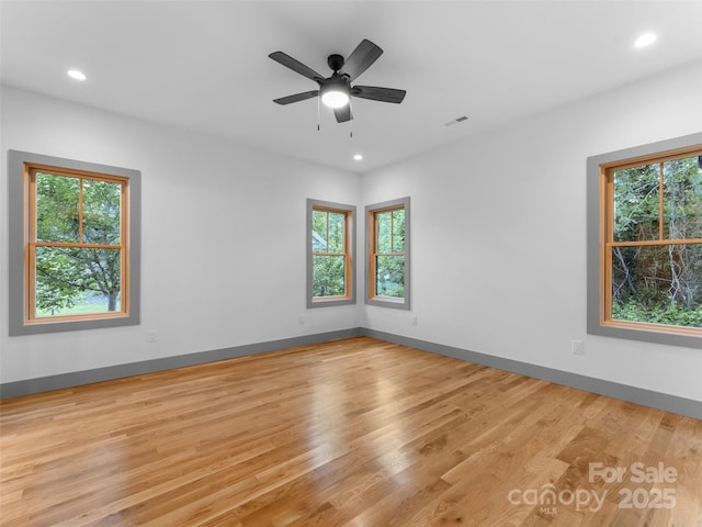 314 Gallimore Rd Unit 1, Brevard, NC 28712 - empty room featuring plenty of natural light, light wood-style flooring, and recessed lighting