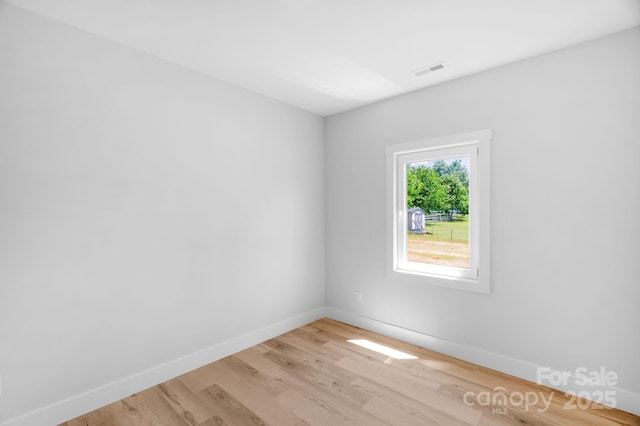 2104 County Line Rd, Kings Mountain, NC 28086 - empty room featuring light wood-type flooring and baseboards