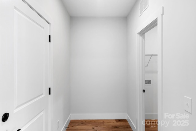 2104 County Line Rd, Kings Mountain, NC 28086 - laundry room featuring baseboards and wood finished floors