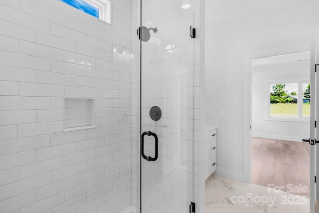 2104 County Line Rd, Kings Mountain, NC 28086 - bathroom featuring plenty of natural light, a shower stall, baseboards, and vanity
