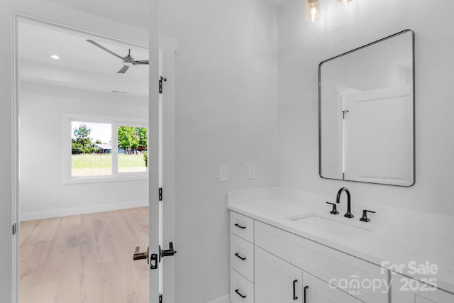 2104 County Line Rd, Kings Mountain, NC 28086 - bathroom with vanity, baseboards, and wood finished floors