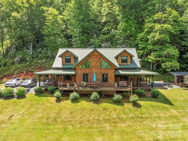 70 Eagles Wings Pl, Whittier, NC 28789 - view of front facade with a front lawn, a wooded view, metal roof, and a porch