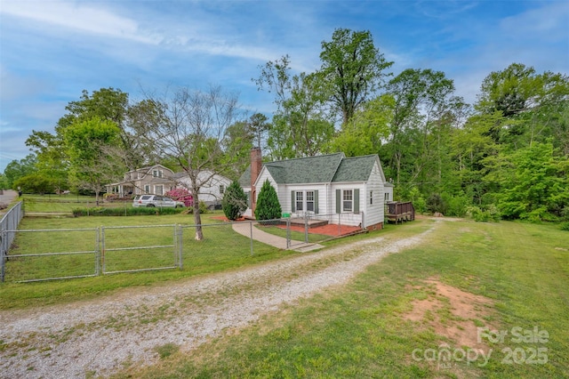 123 N Poston St, Shelby, NC 28150 - view of front of house featuring a wooden deck, a chimney, driveway, and a gate