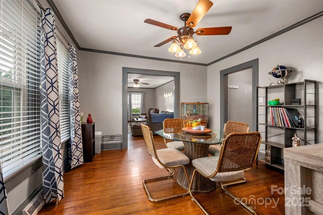 123 N Poston St, Shelby, NC 28150 - dining room featuring a ceiling fan, crown molding, and wood finished floors