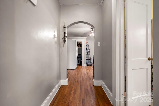 123 N Poston St, Shelby, NC 28150 - hallway featuring dark wood finished floors, arched walkways, and baseboards