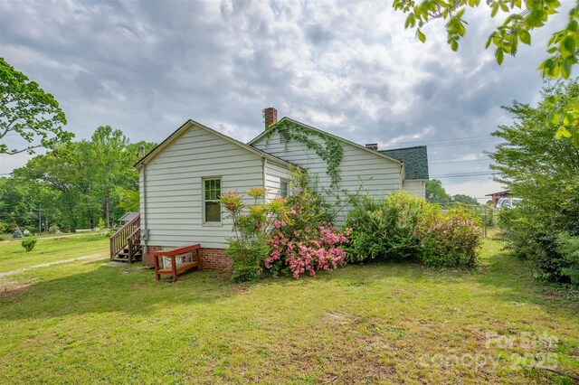 123 N Poston St, Shelby, NC 28150 - view of side of home featuring a yard and a chimney