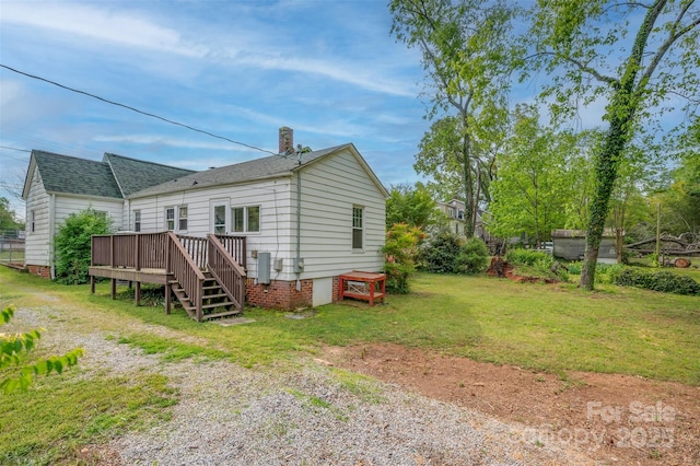 123 N Poston St, Shelby, NC 28150 - back of property with a wooden deck, a chimney, a yard, and roof with shingles