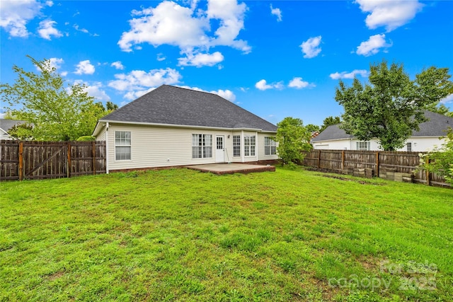 4809 Mossy Cup Ln, Monroe, NC 28110 - rear view of house featuring a patio and roof with shingles