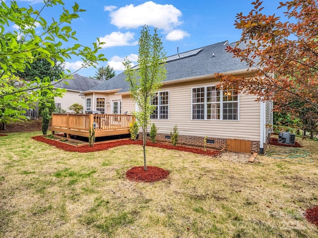 24 Yorktown Cir, Arden, NC 28704 - rear view of property featuring crawl space, a lawn, a deck, a shingled roof, and central AC unit
