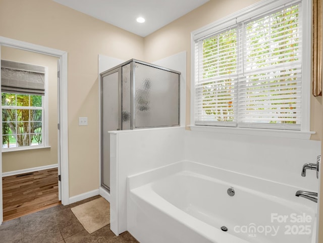 24 Yorktown Cir, Arden, NC 28704 - full bath with a shower stall, a garden tub, healthy amount of natural light, tile patterned floors, and recessed lighting