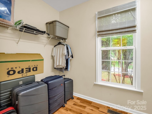 24 Yorktown Cir, Arden, NC 28704 - walk in closet featuring wood finished floors