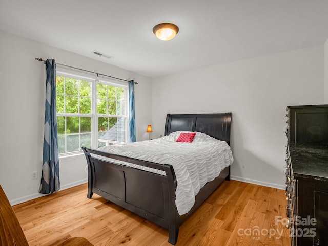 24 Yorktown Cir, Arden, NC 28704 - bedroom featuring light wood-type flooring and baseboards