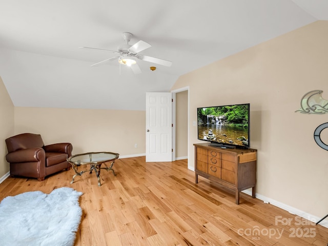 24 Yorktown Cir, Arden, NC 28704 - living area with vaulted ceiling, light wood-style flooring, a ceiling fan, and baseboards