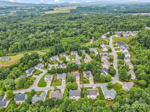 24 Yorktown Cir, Arden, NC 28704 - aerial view of residential area with a heavily wooded area