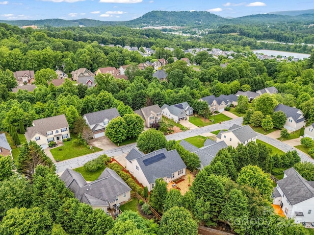 24 Yorktown Cir, Arden, NC 28704 - aerial perspective of suburban area with a mountainous background and a heavily wooded area