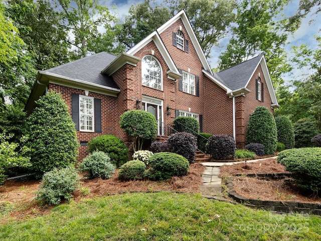 5816 Valley Stream Trl, Waxhaw, NC 28173 - colonial home with brick siding and a shingled roof