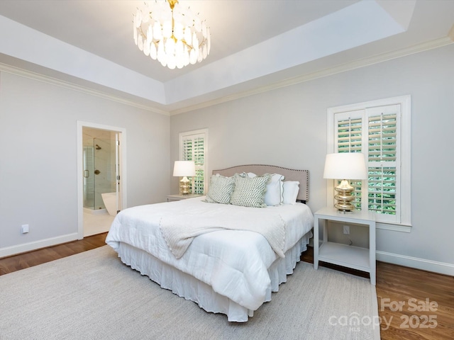 5816 Valley Stream Trl, Waxhaw, NC 28173 - bedroom with a chandelier, crown molding, wood finished floors, multiple windows, and baseboards