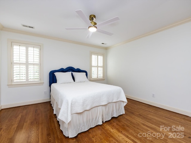 5816 Valley Stream Trl, Waxhaw, NC 28173 - bedroom featuring ornamental molding, baseboards, wood finished floors, and ceiling fan