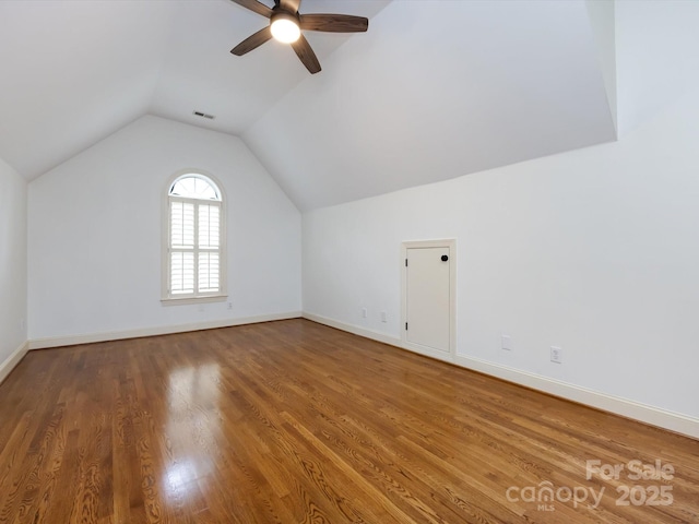 5816 Valley Stream Trl, Waxhaw, NC 28173 - additional living space with ceiling fan, lofted ceiling, wood finished floors, and baseboards