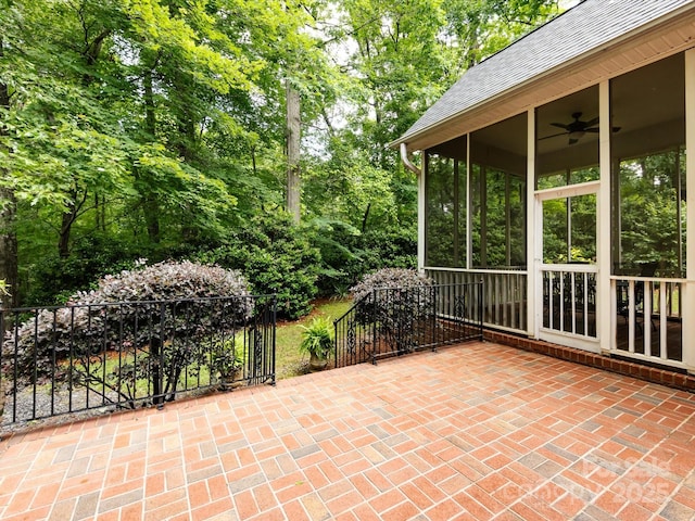 5816 Valley Stream Trl, Waxhaw, NC 28173 - view of patio with a sunroom, a ceiling fan, and view of wooded area