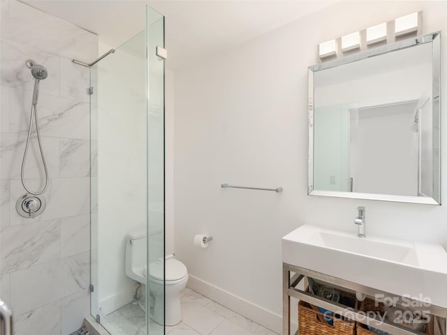6 Browntown Rd, Asheville, NC 28803 - full bathroom featuring marble look tile flooring, a shower stall, toilet, baseboards, and vanity