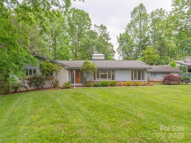 6 Browntown Rd, Asheville, NC 28803 - view of front facade featuring a front yard and a chimney