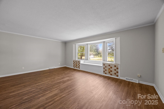 1810 Country Manor Ln Unit 34, Rock Hill, SC 29730 - unfurnished room with dark wood-style floors, a textured ceiling, ornamental molding, and baseboards