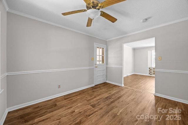 1810 Country Manor Ln Unit 34, Rock Hill, SC 29730 - empty room with wood finished floors, baseboards, ornamental molding, ceiling fan, and a smoke detector