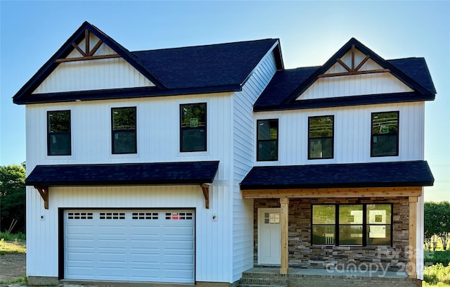 1308 Austin Chaney Rd, Wingate, NC 28174 - modern farmhouse featuring a shingled roof, a garage, and stone siding