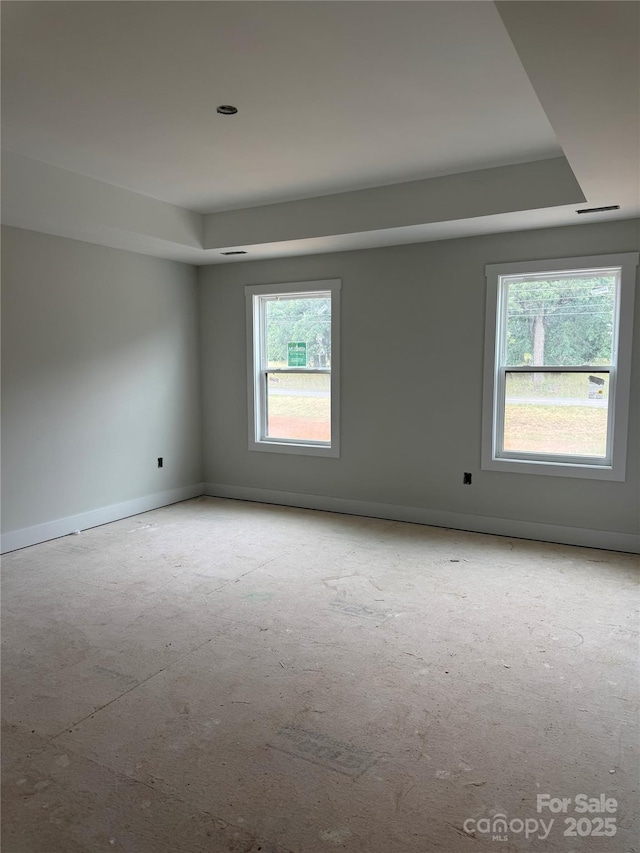 1308 Austin Chaney Rd, Wingate, NC 28174 - empty room featuring baseboards and a raised ceiling