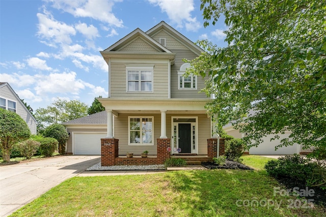 7642 Rolling Meadows Ln, Huntersville, NC 28078 - view of front of property featuring covered porch, a front yard, driveway, and a garage