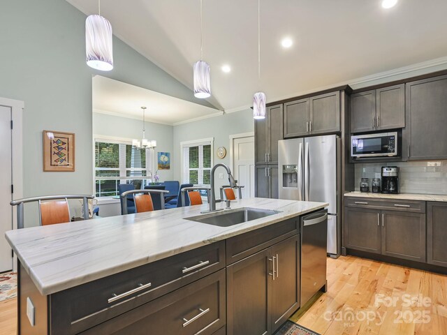 26 Addison Fisher Way, Asheville, NC 28805 - kitchen with a sink, appliances with stainless steel finishes, lofted ceiling, ornamental molding, and tasteful backsplash