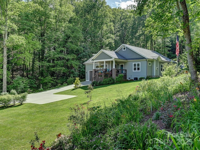 26 Addison Fisher Way, Asheville, NC 28805 - craftsman inspired home with a porch, a front yard, driveway, and a view of trees