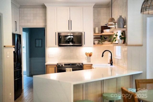 3314 Mara Ct, Matthews, NC 28105 - kitchen featuring stainless steel appliances, a sink, open shelves, light countertops, and tasteful backsplash