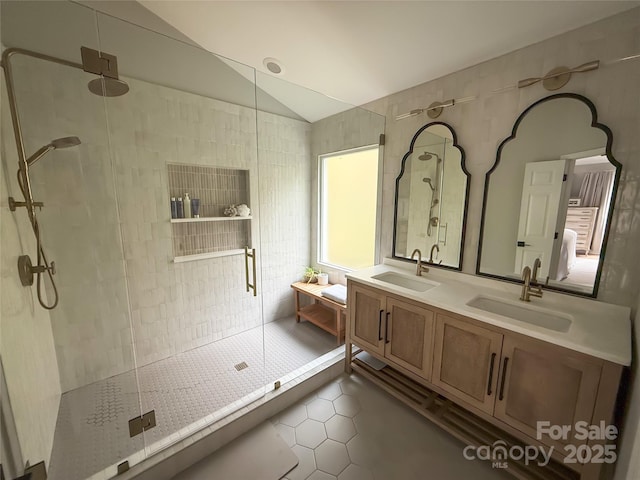3314 Mara Ct, Matthews, NC 28105 - bathroom with tile patterned floors, a stall shower, lofted ceiling, and double vanity