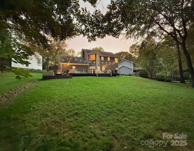 3314 Mara Ct, Matthews, NC 28105 - yard at dusk featuring a deck and a yard