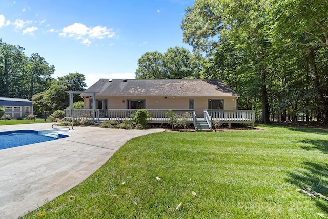 1827 Beckner Rd, Lexington, NC 27292 - rear view of house with a deck, an outdoor pool, a yard, and a patio