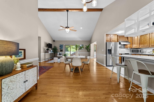 1827 Beckner Rd, Lexington, NC 27292 - dining area with high vaulted ceiling, ceiling fan, beam ceiling, light wood-type flooring, and baseboards