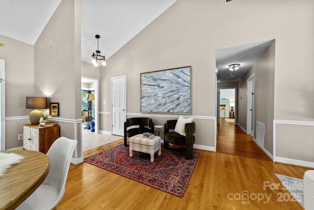 1827 Beckner Rd, Lexington, NC 27292 - sitting room with high vaulted ceiling, wood finished floors, and baseboards